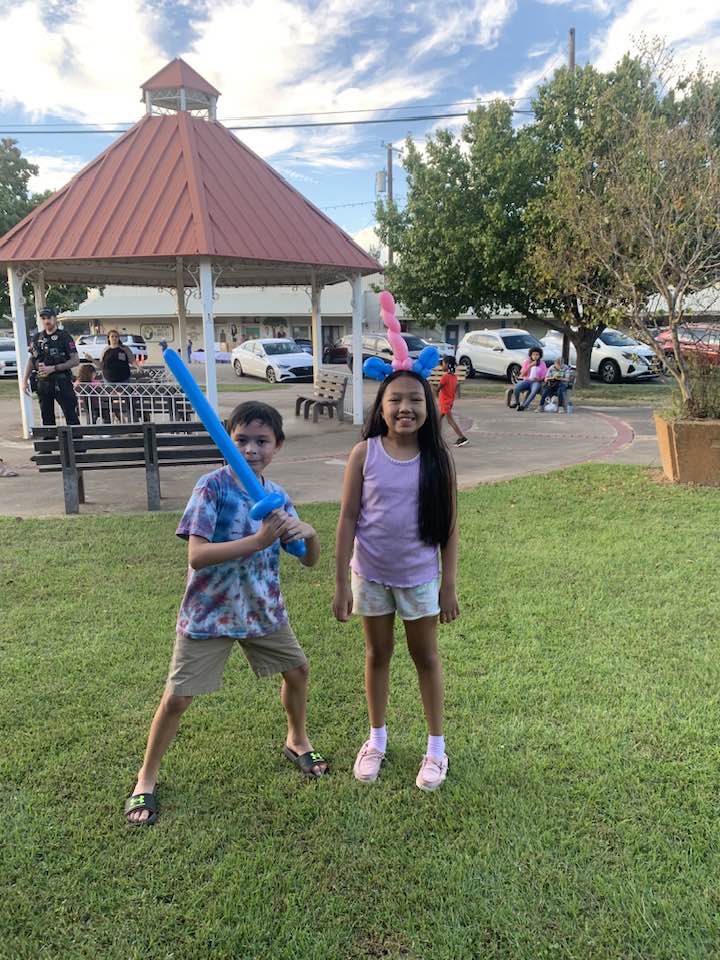 National Night Out - Kids playing baseball around Town Gazebo