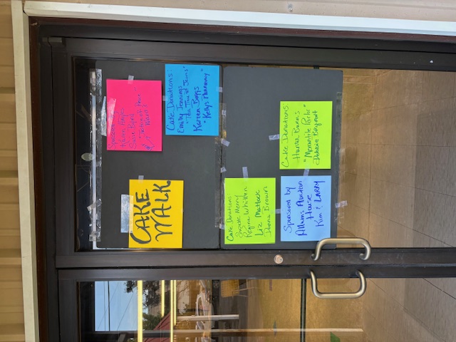 Cake Walk and Donations signs on door
